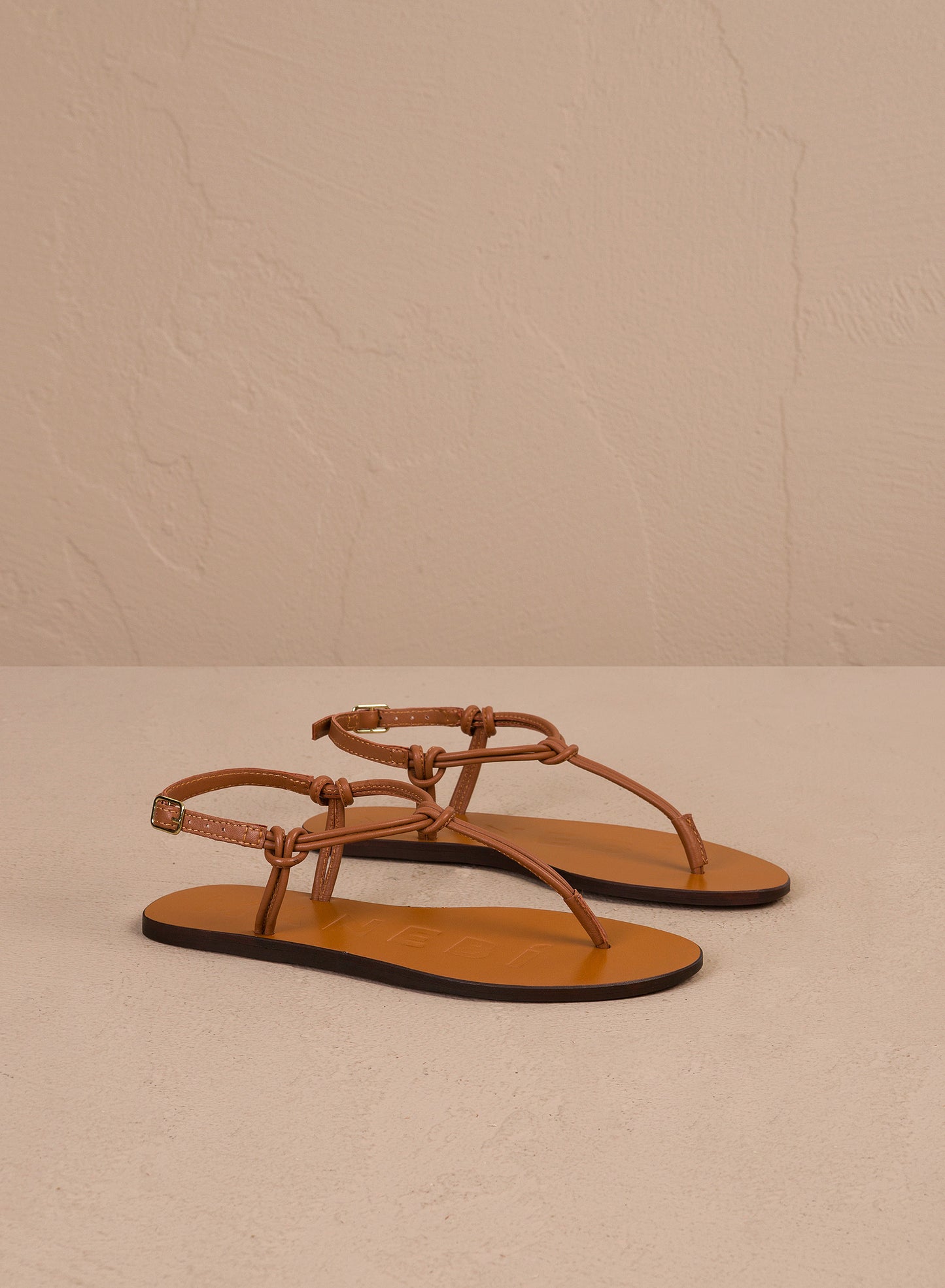 KNOT THONGS LEATHER SANDALS